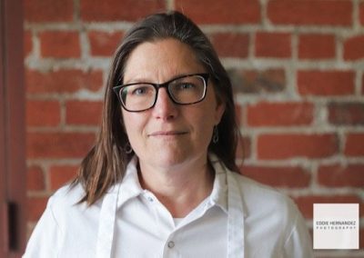 Urban Female Chef Portrait, Indoors, Brick Wall Background Pose, Idea - San Francisco Bay Area Photographer