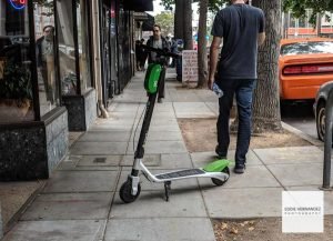Lime Electric Scooter Blocks Sidewalk In Oakland, California
